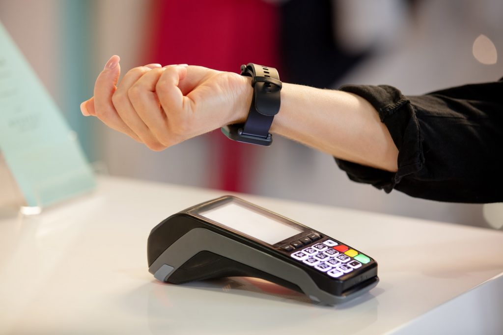 payment for services using a watch through the terminal