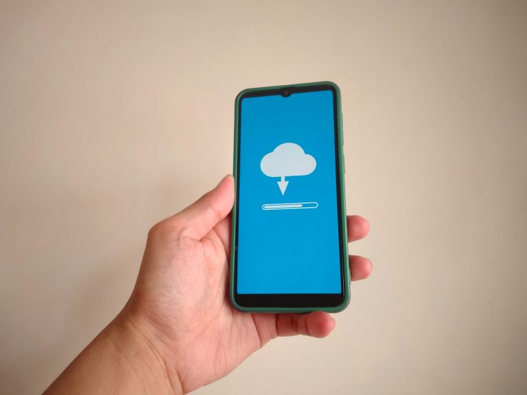 Cloud downloading from mobile phone. Cloud computing concept.
